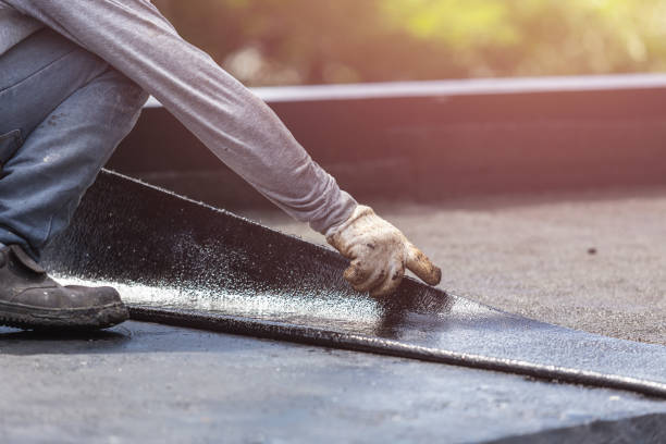 Professional Waterproofing technician working in Greensburg, KY